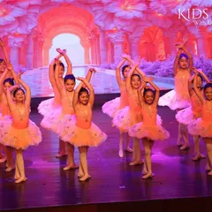 A look at our little ballerinas lighting up the stage. Their performance was a beautiful display of artistry and discipline, choreographed to bring out their natural grace and joy for dance.
