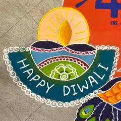 Detail shot of the "Happy Diwali" message and diya from a branded floor art piece. Even with custom text and logos, I ensure the traditional festive feeling is central to the design.