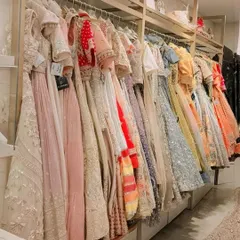 Another look at the rows of beautiful outfits in my store. I ensure every piece is dry-cleaned and in perfect condition for you.