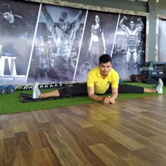 Maintaining the split position. This demonstrates the importance of both flexibility and endurance in static holds.