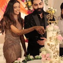 It's always an honor to see my cakes as part of such a special moment. Here is the happy couple cutting their engagement cake.
