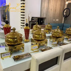 Our food, beautifully presented. This setup for a home event includes our signature Dal Makhani and Kadai Paneer, clearly labeled for guests.