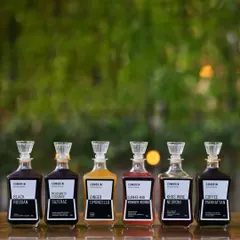 We bottle our best stories so you can take them home. From our zesty Ginger Limoncello to a complex Khus Wine Negroni, these house-made liqueurs are ready whenever you are.