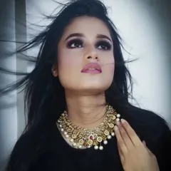 This is a dramatic photoshoot look with a bold smokey eye and a soft pink lip. It shows my ability to create high-fashion and editorial makeup styles that are perfect for the camera.