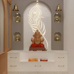 This pooja unit features a backlit peacock feather design, creating a divine focal point. Niches on the side provide space for smaller idols.