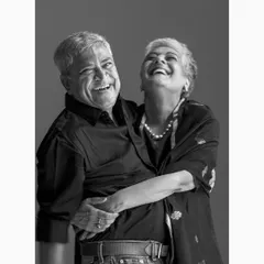 A portrait capturing a moment of pure joy and enduring friendship between a couple. My goal is to document these unscripted, authentic emotions that define a relationship, creating timeless black and white couple portraits.
