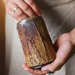 This tumbler carries the memory of its making. The textured surface is a result of exploring different slips, oxides, and firing atmospheres, creating a piece that invites you to pause and feel its journey.
