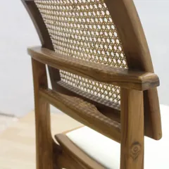 A close-up of the joinery and cane work on one of my custom chairs. I believe the love for real, hand-woven cane will never fade. It's a timeless material that adds texture and lightness to any design.