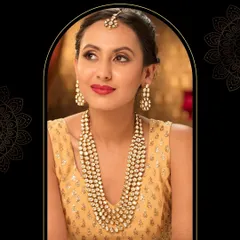 This round Polki Kundan opera-length long necklace set is a statement in itself. It's perfect for wearing over a simple blouse for a pre-wedding event or for layering with a choker.