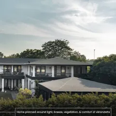 The House of Verandahs is planned around light, breeze, and the comfort of its namesake transitional spaces. The architecture is thoughtfully positioned to optimize shade and airflow, creating a home that is naturally cool and connected to its landscape.