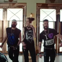 To add a fun twist to the wedding film, I styled these guests in full rocker gear, contrasting with the traditional setting.