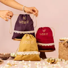 My modern take on the traditional thamboolam. These velvet potlis in rich jewel tones are a favorite for weddings, combining timeless elegance with a fresh, stylish feel that guests will love and reuse.