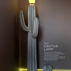 The Rooh Cactus & Buidling Set captures the essence of desert flora in a durable stone-composite structure. This set brings a cohesive yet playful sculptural element to interior or covered outdoor spaces.