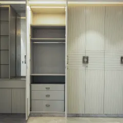 A look inside our fluted wardrobe, revealing a spacious hanging area, drawers, and adjustable shelves. The design combines beautiful aesthetics with practical, everyday functionality.