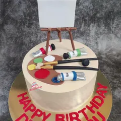 The complete artist-themed cake, a perfect and personal way to celebrate a creative person's birthday.