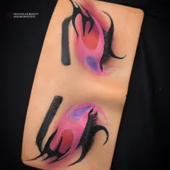 Another angle of the dramatic graphic liner practice, demonstrating the creativity and control required for advanced eye makeup.