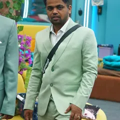 A full-length view of the custom-tailored mint green suit. The fit is sharp and comfortable, designed to make a statement.