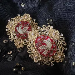 Doves have long been a symbol of hope, peace, and everlasting love. These "Forever Dlove" eartops feature micromosaic doves in an 18k gold lace border, perfect for celebrating a new journey or a lasting bond.