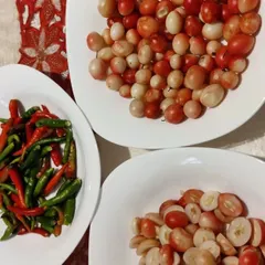 These are fresh Karonda berries and green chillies, ready to be turned into a tangy and unique pickle. Karonda is a sour berry that is full of Vitamin C.