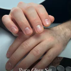 For a clean and understated look, I offer the 'Pure Clean Set'. This service focuses on meticulous cuticle care, shaping, and buffing for healthy, well-groomed nails without any polish.