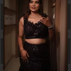 Ready for her sangeet night in a gorgeous sequined outfit. I gave her a full glam look with defined eyes and a hairstyle with soft curls to match the vibe.