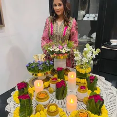 Adorned with flowers and prayers, this tablescape was designed to welcome Lord Ganesh. It seeks to capture the spirit of the festival, blending devotion with beautiful, intricate floral arrangements and the warm glow of candles.