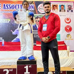 As a coach, these are the moments I live for. Standing beside my student Shikha as she receives her gold medal, knowing she will now represent the official Karnataka State Karate Team.