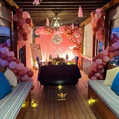 A closer look at the date night setup, with a "My Special One" sign and cozy seating, perfect for a surprise celebration.