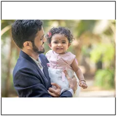 A heartwarming portrait of a father and his smiling daughter. These are the moments you will look back on and treasure for a lifetime.