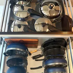No more noisy, cluttered pot drawers. We use smart vertical stacking solutions to protect your cookware and make every pot, pan, and lid easy to grab, transforming a daily frustration into a moment of ease.