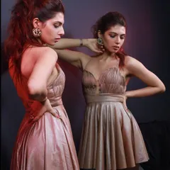 A brand shoot for Elviraa Official, featuring a golden ruched mini dress. I styled this look to feel luxurious and confident, perfect for an evening party. The mirror shot adds a dynamic and reflective element.