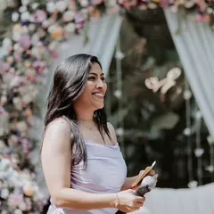 A candid smile while hosting a beautiful Catholic wedding reception in Mangalore. My experience as a Konkani emcee allows me to connect deeply with the couple and guests during these special celebrations.