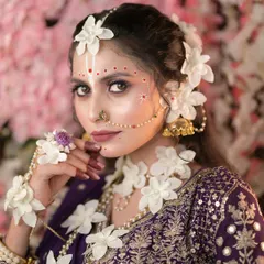 Makeup is an art form, and in my classes, we explore creativity. This is a close-up of a conceptual Radha look we created for Janmashtami, focusing on intricate details, soft makeup, and beautiful floral jewelry.