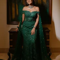 This portrait captures the bride's radiant smile and the elegant makeup. The look is polished and sophisticated, perfect for an evening of celebration.