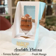 Our Festive Dessert Glass is an elegant and delicious gift. This one comes in a special gift box and is available in popular flavors like Ferrero Rocher, Tiramisu, Fresh Mango, Lotus Biscoff, and Blueberry Cheesecake.
