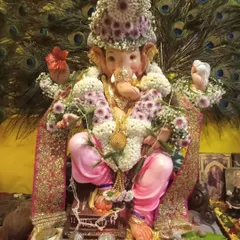 A close-up of our floral adornments for a beloved Ganpati Bappa. We design everything from the delicate garland to the intricate crown, using fresh flowers to bring divine beauty to your festival celebrations.