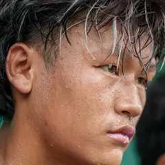 The face of determination. A close-up of one of our players, sweat-drenched and completely focused during a high-stakes DPDL Super Cup match.