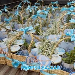 A beautiful hot air balloon themed hamper we created for baby Ayansh's first birthday. We used jute baskets and fresh gypsum flowers to give it a soft, natural, and celebratory feel.