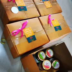 Here are some of our gift boxes, all packed and ready to be shipped. We add a little ribbon to make each delivery feel like a special present.