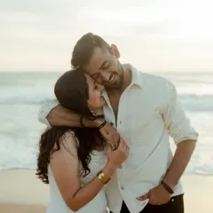 A warm and affectionate hug on the Goan shore. This photo captures a moment of pure happiness and comfort, with the gentle waves in the background adding to the romantic atmosphere.
