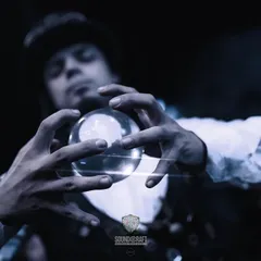 A close-up on the artist's hands as he manipulates the crystal ball, making it appear to float weightlessly. This showcases the incredible skill behind the illusion.