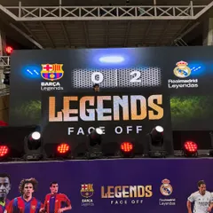 Peeking over the console at "The Sports Legends Face Off" event. Seeing the final score on the big screen while being the official DJ was an unreal experience.