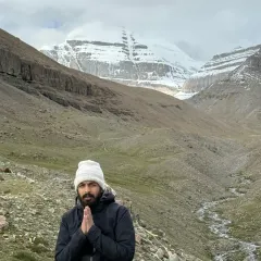A moment of prayer and offering with Kailash in the background. Every step on this land feels like a conversation with the divine, a humbling experience of being in Shiva's presence.
