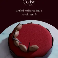 This is my Choco Framboise, finished with a deep red velvet spray. The finish is not just for appearance; it seals the delicate layers inside, preserving the textures of the dark chocolate mousse and sharp raspberry crémeux until you are ready to indulge.