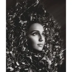 An artistic outtake from the Elle Digital cover shoot with Masoom Minawala. This close-up uses creative light trails and a textured headpiece to create a surreal, almost celestial portrait.