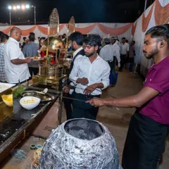 My tandoor station in full swing at a large wedding in Panvel. Guests can enjoy a variety of fresh, hot breads like naan and roti made right before their eyes.