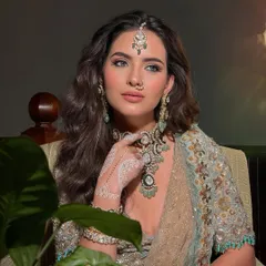 A portrait capturing the regal essence of the Modern Maharani look. The focus is on her powerful eyes, defined by sharp liner and kohl.