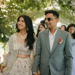 The joy of a wedding day, captured perfectly. The groom's custom sage green suit was designed to feel effortless and look impeccable, allowing him to be fully present in the moment while looking his absolute best.