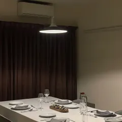 A view of the dining space I create for my private events and supper clubs. The focus is on comfort, elegance, and creating a warm atmosphere for guests to connect over food.