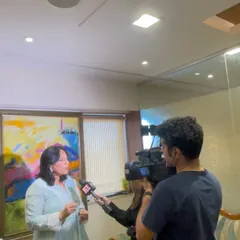 In my office, giving an interview about a recent Bombay High Court decision. It's important to analyze and share insights on such rulings.